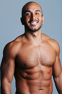 selective focus photography of topless man thumbnail
