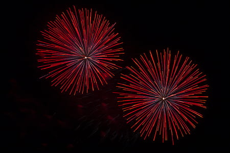 low angle photography of red fireworks thumbnail