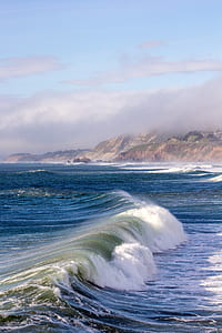 time lapse photography of splashing ocean waves thumbnail