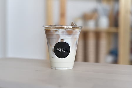 selective focus photo of Slash cup filled with liquid thumbnail