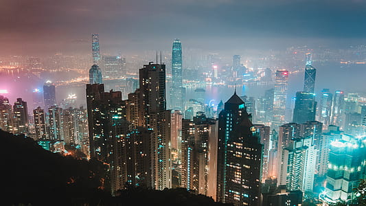 aerial view of city at nighttime thumbnail