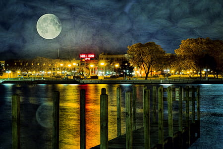 brown wooden dock near bodies of water at night time thumbnail