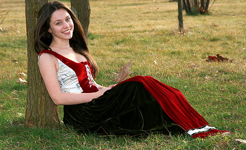 woman wearing red and white sleeveless maxi dress thumbnail