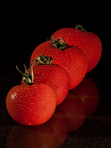 closeup photo of four red tomatoes thumbnail