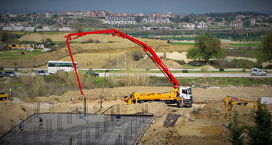 red and yellow mobile crane on field thumbnail