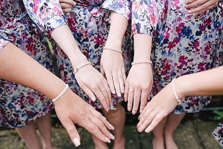 women showing their hands thumbnail