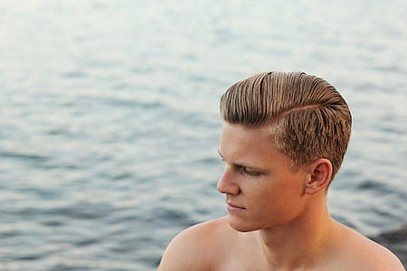man near body of water thumbnail