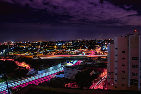 time lapse photography of city building during nighttime thumbnail