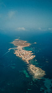 brown archipelago on a body of water thumbnail