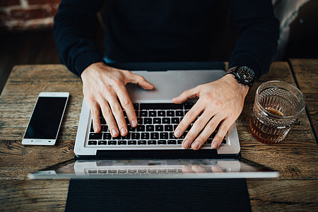 Young Entrepreneur Working from a Modern Cafe thumbnail