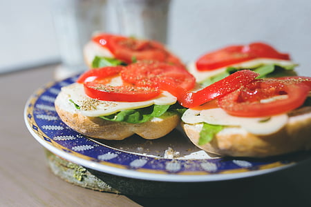 baked bread with tomatoes on plate thumbnail