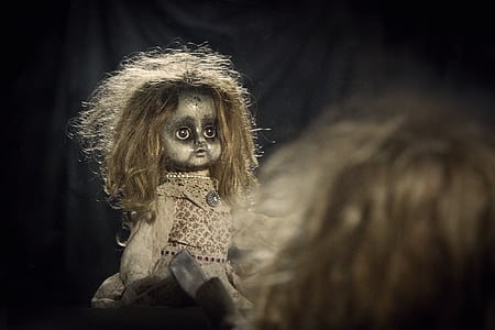 doll wearing white dress thumbnail