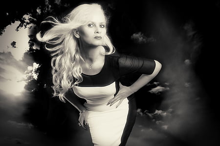 woman wearing black and white dress thumbnail