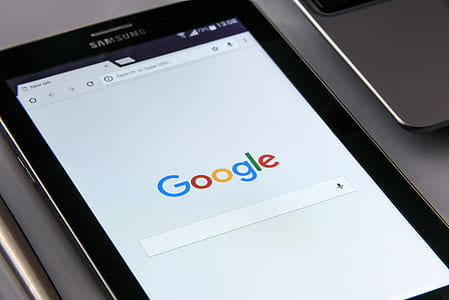 black Samsung Galaxy tab on grey table thumbnail