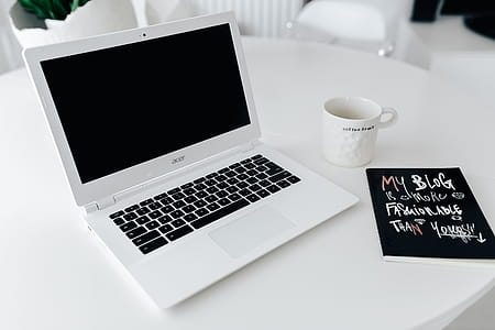 Workplace with laptop on table at home thumbnail
