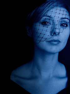woman wearing black face net thumbnail