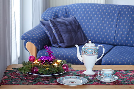 white-and-blue floral tea set on brown wooden coffee table thumbnail