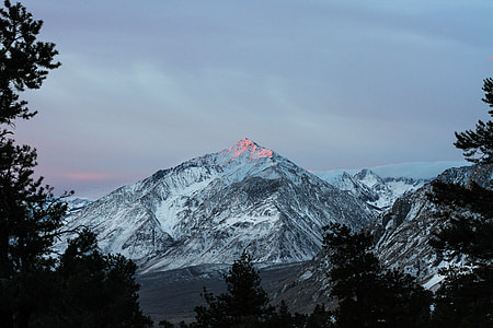photo of rock mountain covered with snow thumbnail