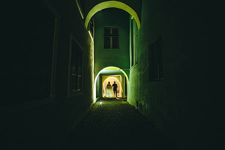 bride and groom walking on hallway thumbnail