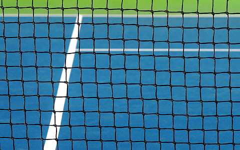 closeup photography of tennis net thumbnail
