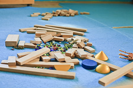 brown wooden learning blocks on floor thumbnail