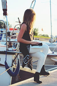 Girl sitting on the boat thumbnail