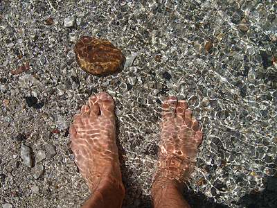 person standing on gray surface thumbnail