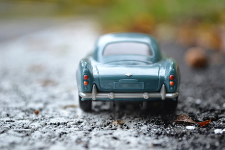 shallow focus photo of green car toy thumbnail