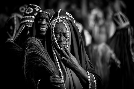 grayscale photography of people wearing robes thumbnail
