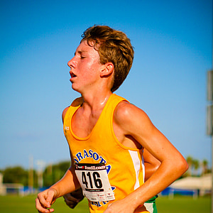 boy in yellow Arasota jersey thumbnail
