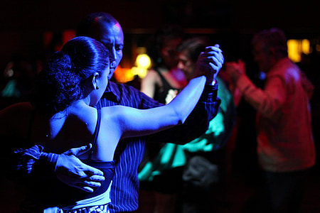 man and woman dancing under disco light thumbnail
