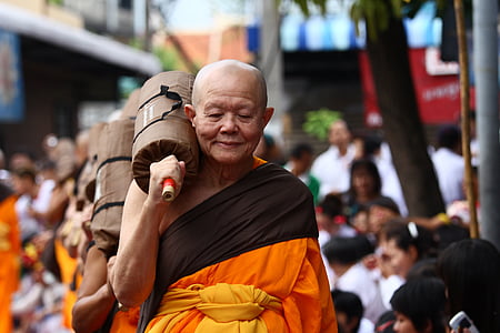 monk carrying bag thumbnail
