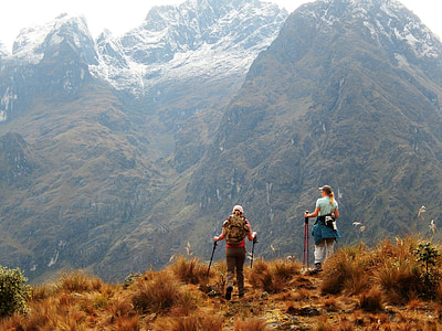 two woman standing overlooking mountain at daytime thumbnail