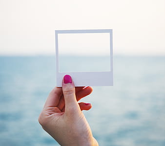 Person Holding Square White Paper thumbnail