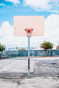 white and brown basketball hoop cleared during daytime thumbnail