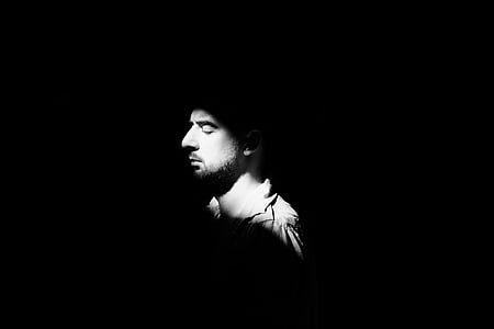 grayscale photography of man wearing collared shirt thumbnail