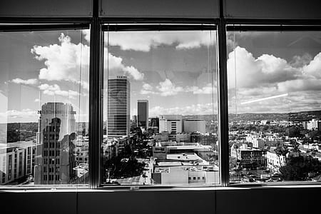 grayscale photo of high rise building thumbnail