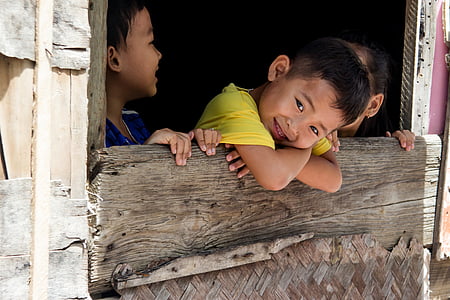 boy wearing green T-shirt thumbnail
