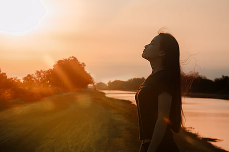 woman standing on seashore thumbnail