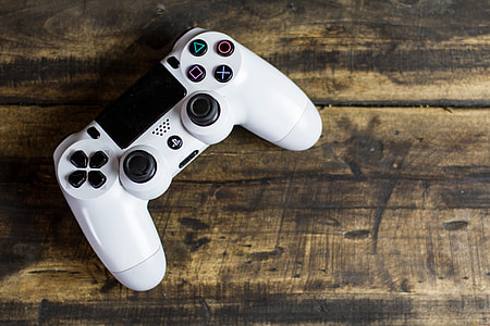 White PS4 gaming controller thumbnail
