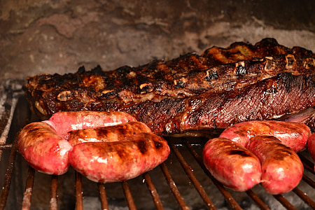 sausage beside meat on grill thumbnail