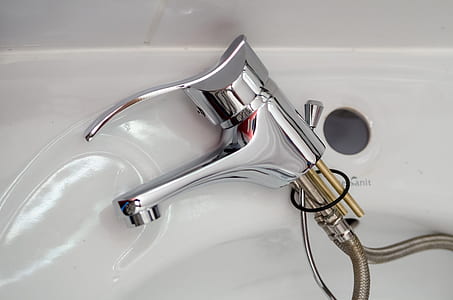 gray faucet on white ceramic bathtub thumbnail