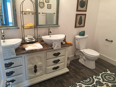 white wooden dresser and white ceramic toilet sink thumbnail