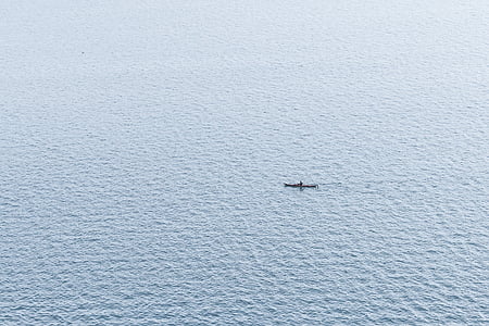 man on boat at sea thumbnail