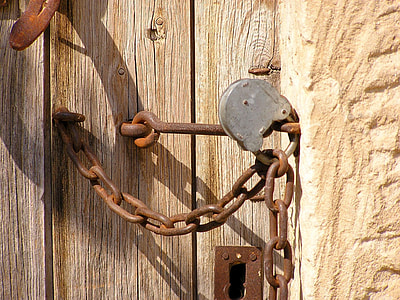 close-up photography of chain with lock thumbnail