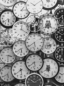 Black And White Photo Of Clocks thumbnail