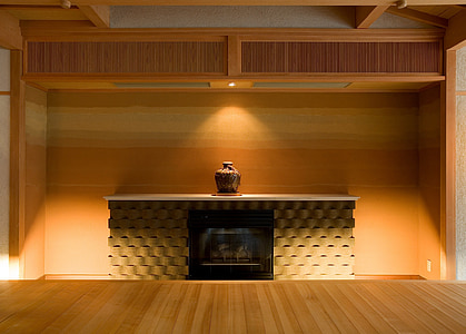 brown jar on fireplace thumbnail