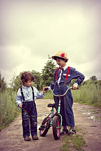 bicycle between girl and boy thumbnail