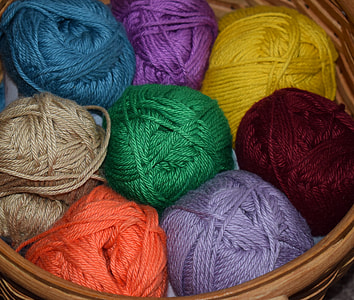 assorted-color ball yarns in box thumbnail