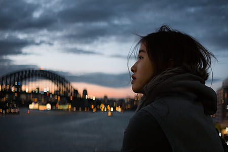 selective focus photography of woman wear hoodie thumbnail